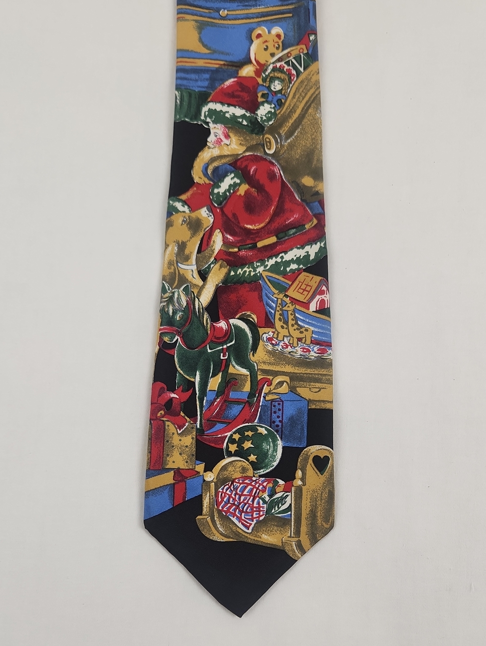 Festive Santa Toys Christmas Print Men's Tie in Black, Red, Green And White